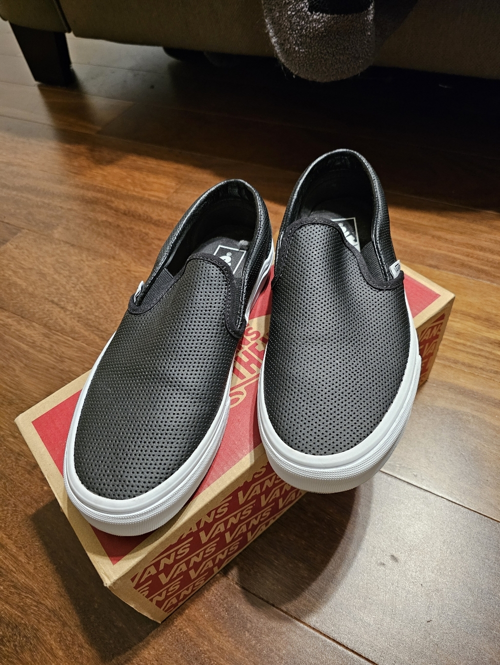 Vans Black Perforated Leather Slip-On Sneakers